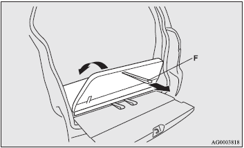 6. Fold the seatback while pulling the belt (F) located in the centre of the