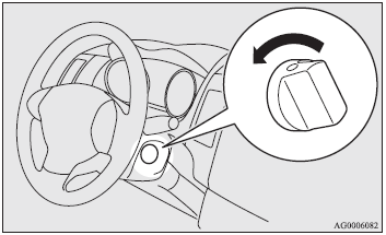 Put the gearshift lever into the “N” (Neutral) position, and slowly turn the