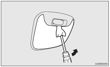 1. Insert a minus screwdriver with the end covered with a cloth or other object