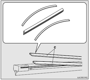 4. Insert the wiper blade into the arm, starting with the opposite end of the