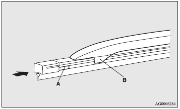 5. Push the wiper blade until the hook (B) engages securely with the stopper