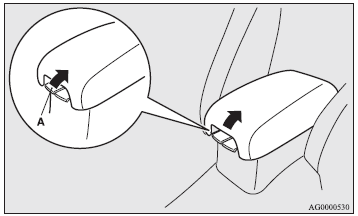 To open the upper box, lift the right release lever (A) and raise the lid.