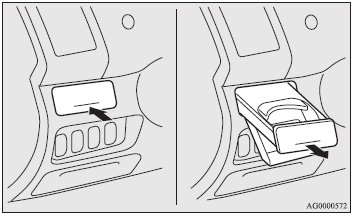 There is a built-in cup holder in the instrument panel on the driver’s side.