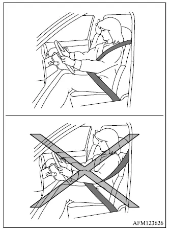 Mitsubishi Outlander occupant seated upright with the seat belt positioned correctly