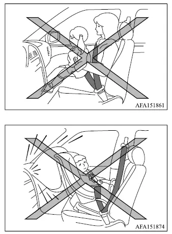 Mitsubishi Outlander child being held on an adult's lap instead of using a child restraint
